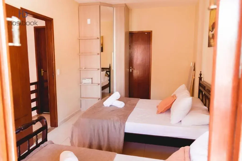 Casa a 400 m da praia do centro - WIFI 200MB - Garagem - TV 500 canais - 2 Quartos - Cozinha equipada - Churrasqueira