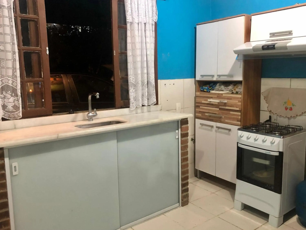 Casa da mata com piscina natural em condomínio