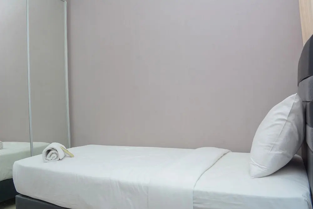 Homey And Cozy Stay 2Br At Casa Grande Apartment