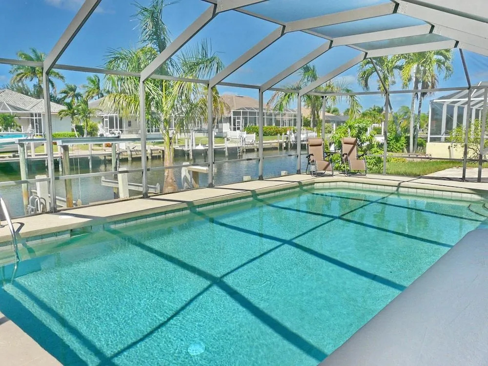 Waterfront home with pool and western exposure