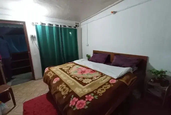 Goroomgo Ananda Homestay Kausani