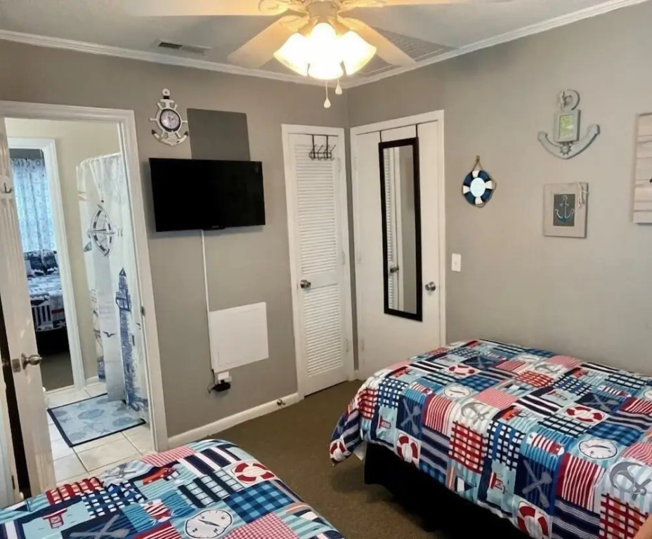 Sandy Bottoms 4 Bedroom Home by RedAwning