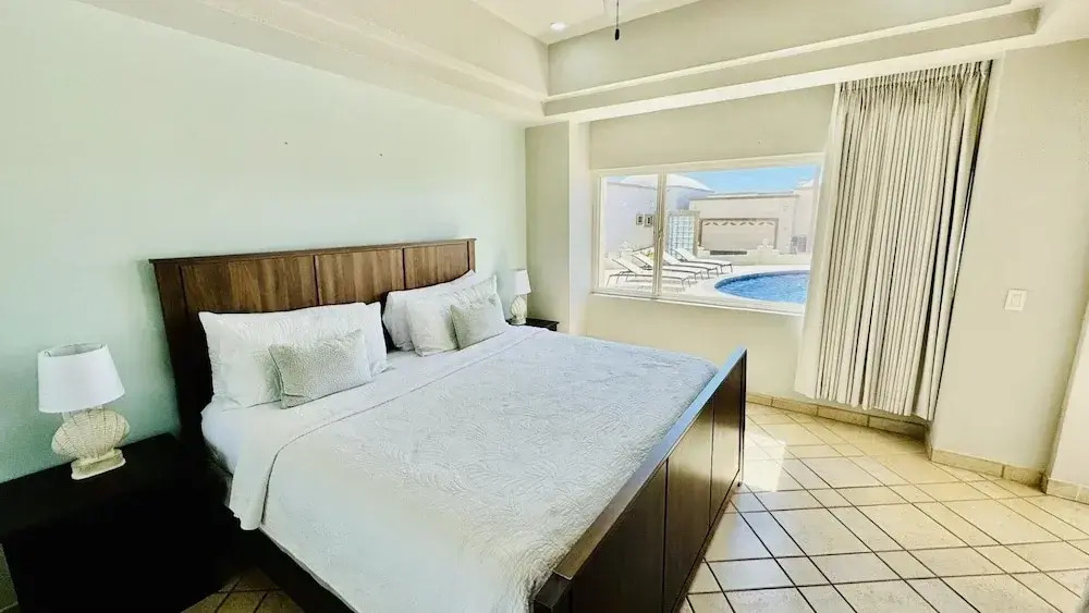 Spectacular 1 1/2 Bedroom Condo on Sandy Beach at Las Palmas Beachfront Resort 1 Condo by RedAwning