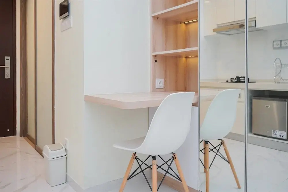 Minimalist and Comfy Studio at Sky House BSD Apartment By Travelio