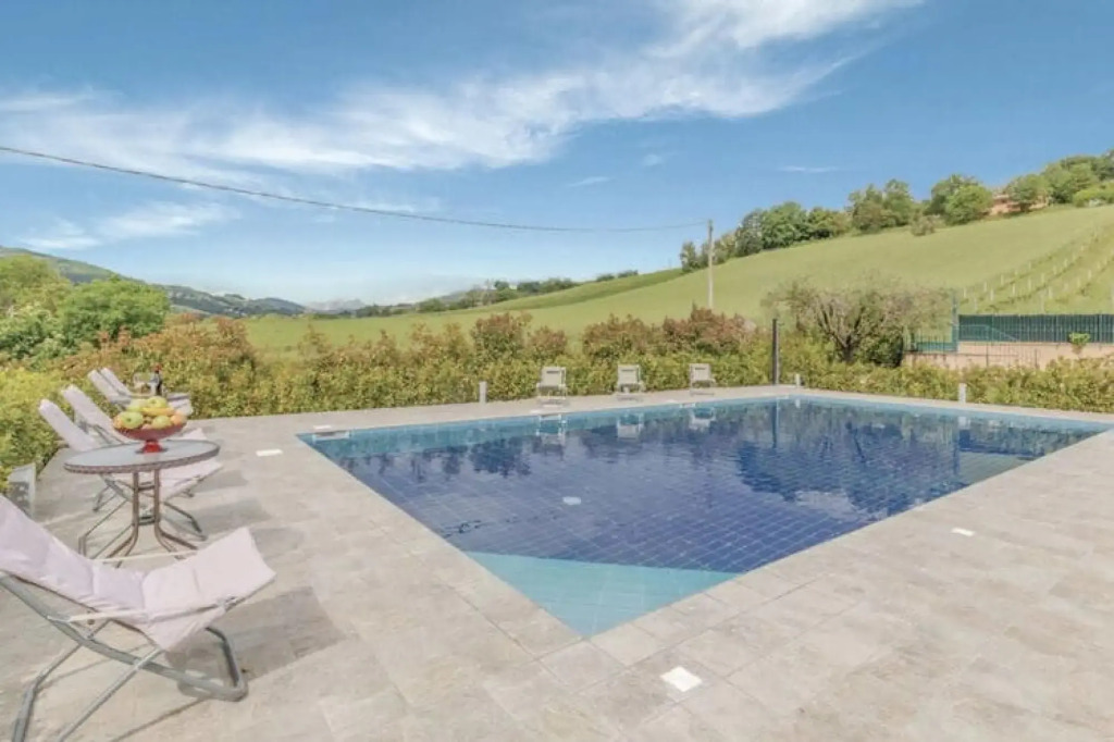 Beautiful holiday home in Montedinove with shared pool