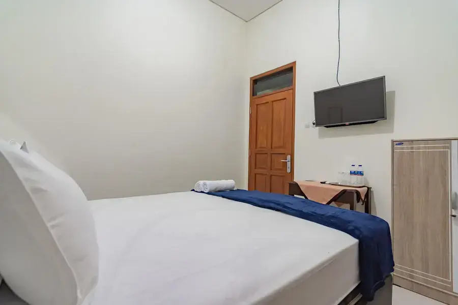 The Lima Guest House Syariah Mitra RedDoorz