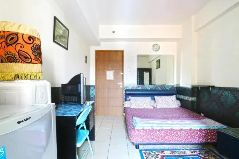Dewi Depok Apartment by ZUZU