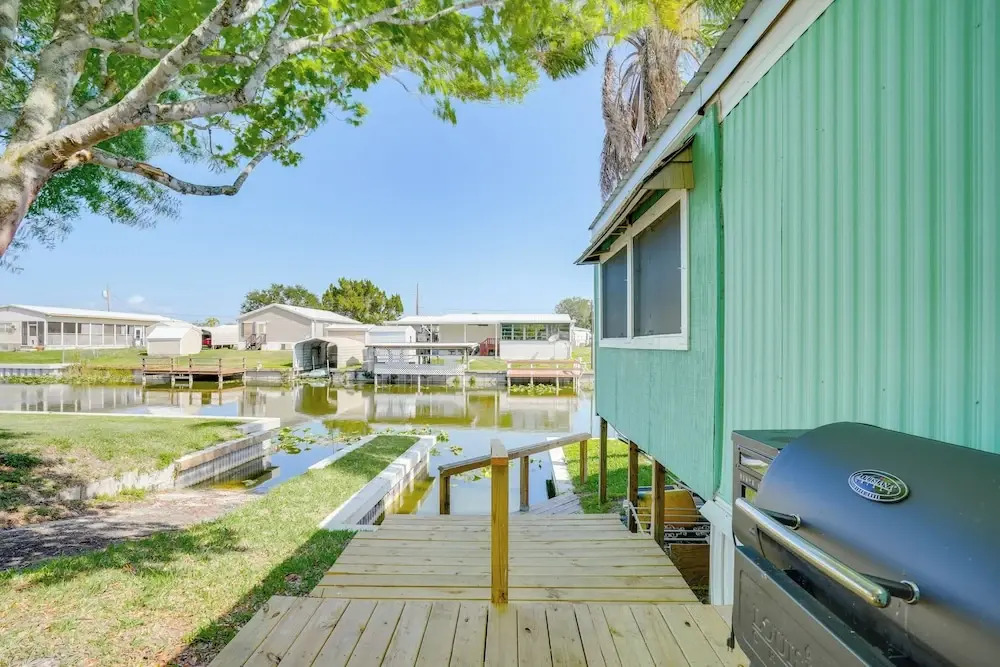 Boat & Fish: Canal-front Home on River