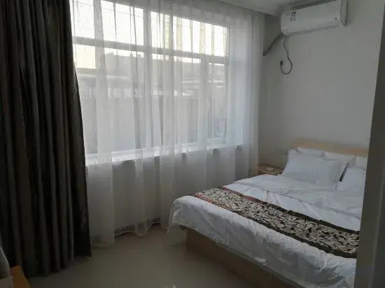 Kangping Hexing Hostel