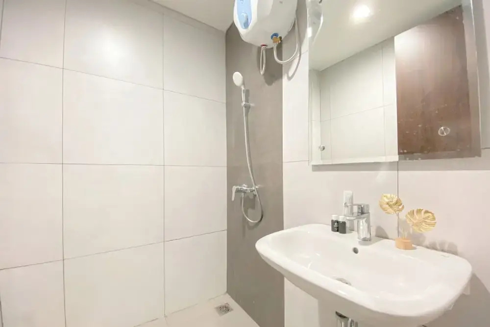 Simple White Designed Studio At Lrt City Bekasi Apartment