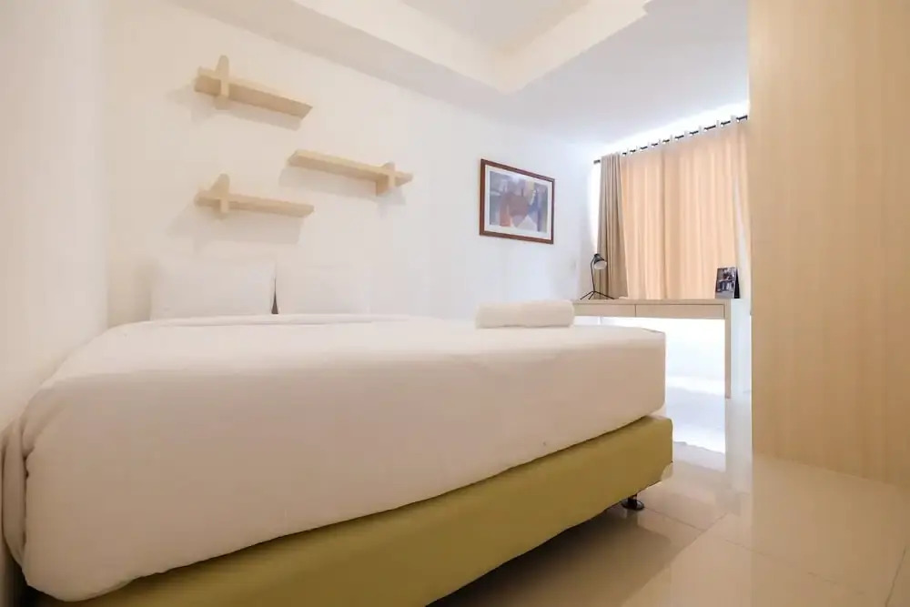 Spacious 2 Bedroom at Bassura City Apartment By Travelio