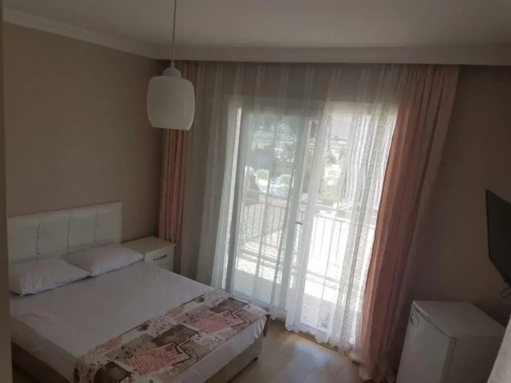 Midilli Otel Sarimsakli