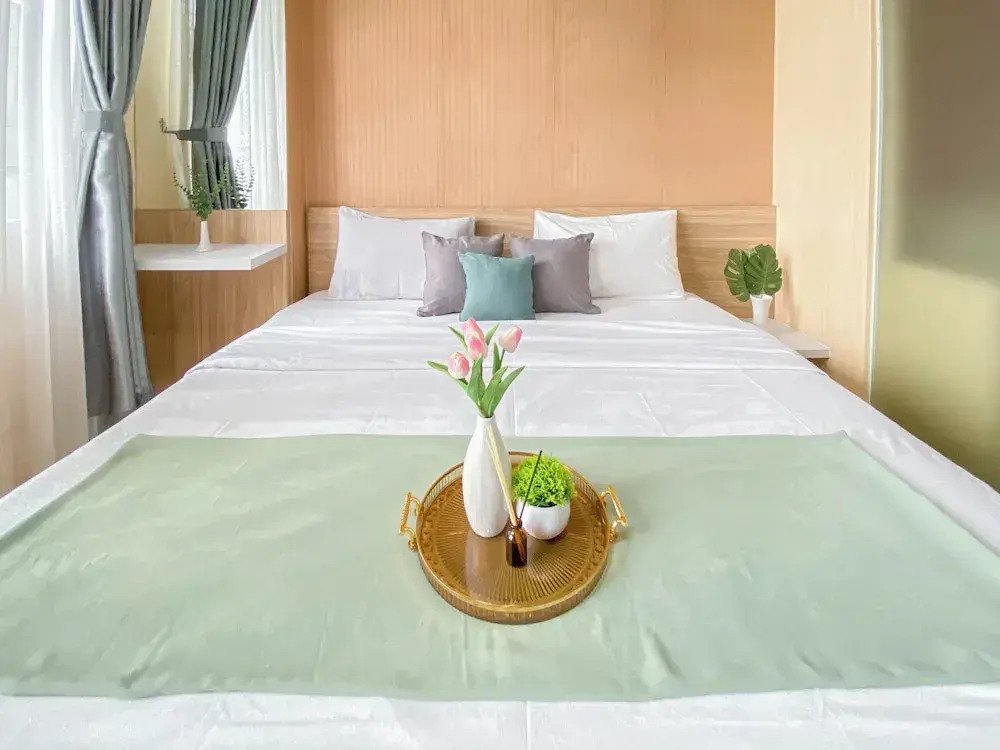 Homey and Comfortable 1BR Apartment at Dago Suites