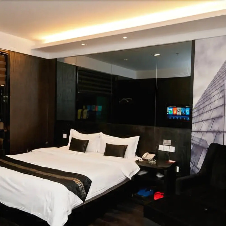 Shijia Boutique Chain Hotel (Kenli Zhongxing Road Store)