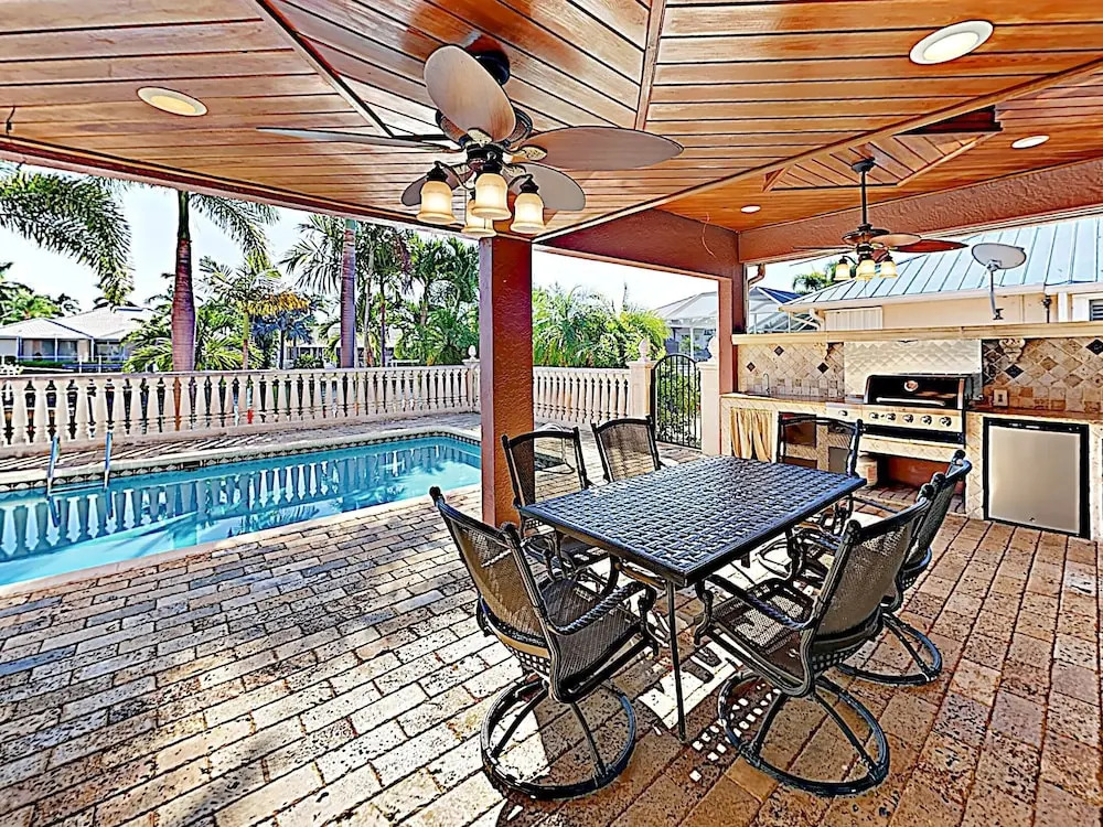 New Listing! European-style On Canal W/ Pool 4 Bedroom Home
