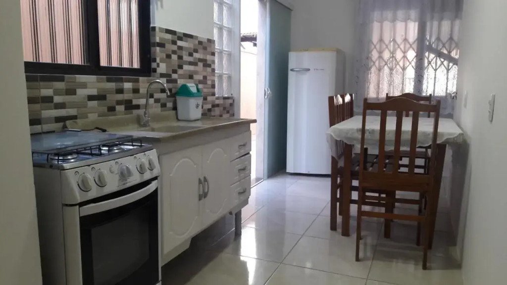 Casa 01 Dorm Terreno Compartido