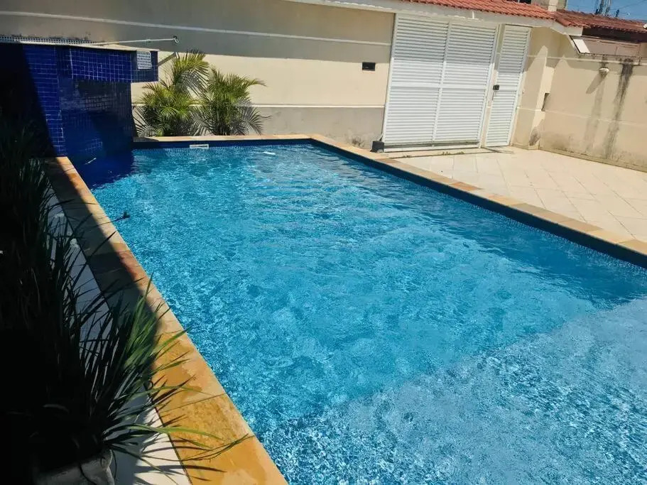 Casa de praia com piscina e churrasqueira - Indaiá Bertioga