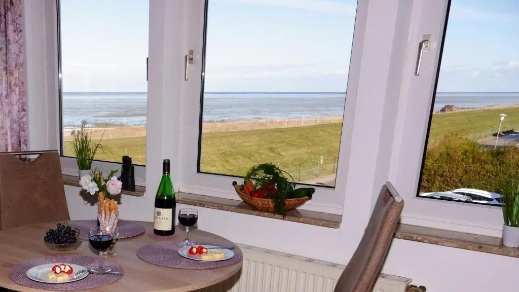 Whg 11 im Haus Nordseeperle - gemütliche Ferienwohnung in direkter Strandlage mit Meerblick