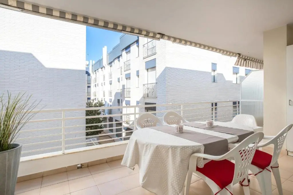 Lets Holidays White Apartment with Terrace, AC & Parking, Near Beach