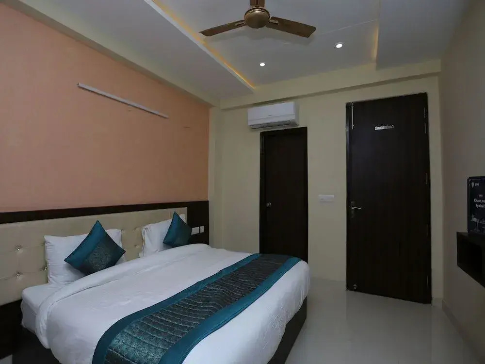 OYO Flagship 12081 Palm Garden Suites