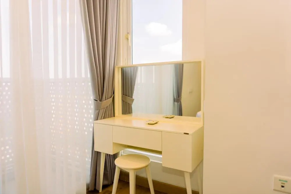 Spacious 1BR with Japandi Design at West Vista Apartment By Travelio