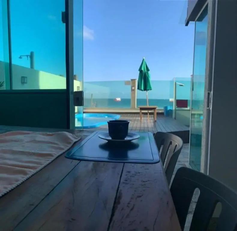 Triplex pé na areia