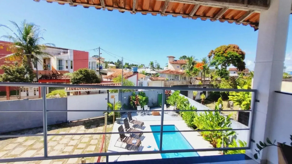 Casa de 4 suítes com piscina e área gourmet em Porto Seguro - Casa dos Ipês