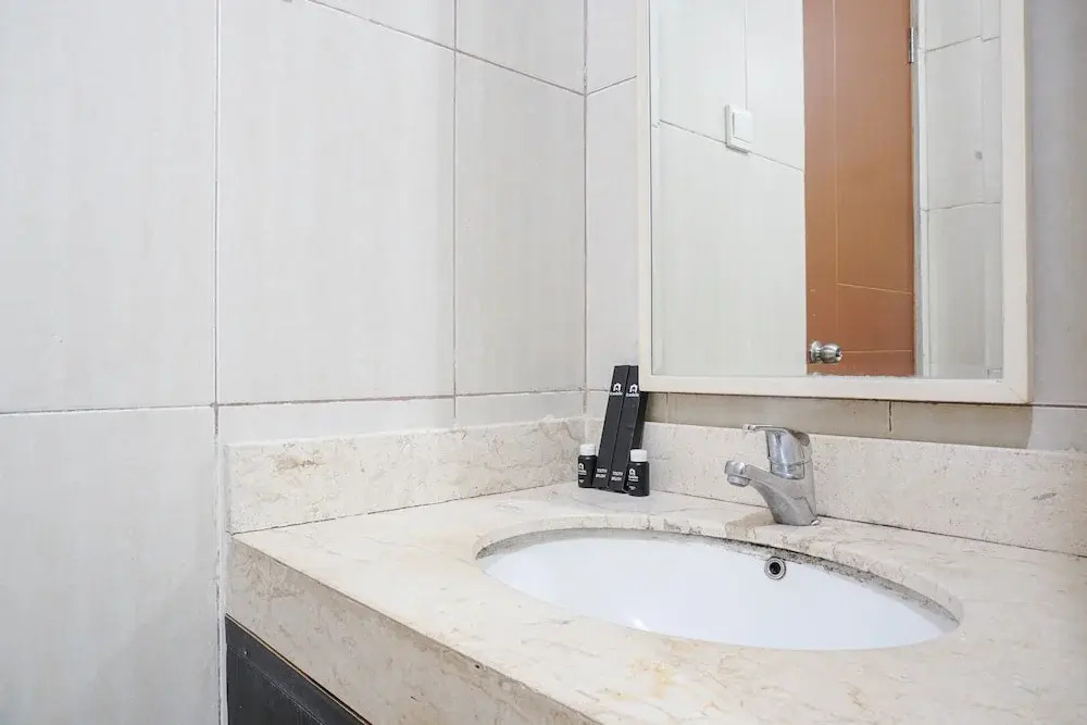 Best Location and Cozy 2BR The H Residence Apartment By Travelio