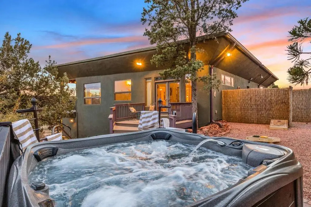Close to Fresh Creek! Sleeps 12 ~ Amazing Views w/Serene Open Space ~ Hot Tub + Game Room ~ Trails outside