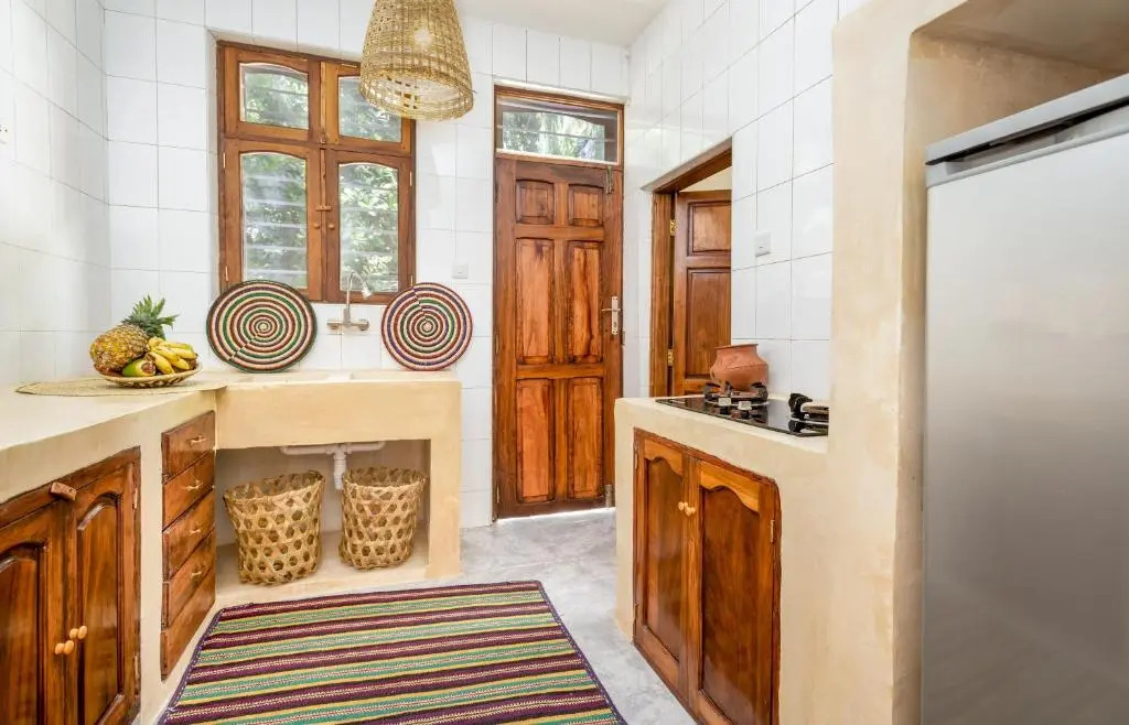 KIMA Serviced Beach House & Suites