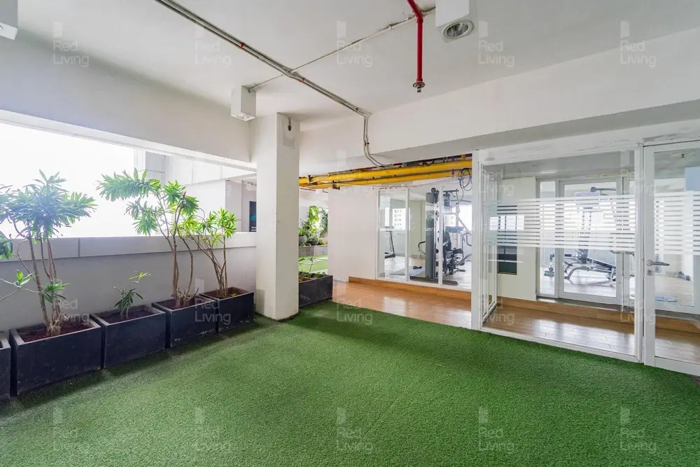 RedLiving Apartemen Grand Kamala Lagoon by Ownr Room