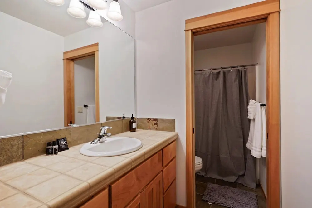 Professionally Decorated Shevlin Home features Private Hot Tub by RedAwning