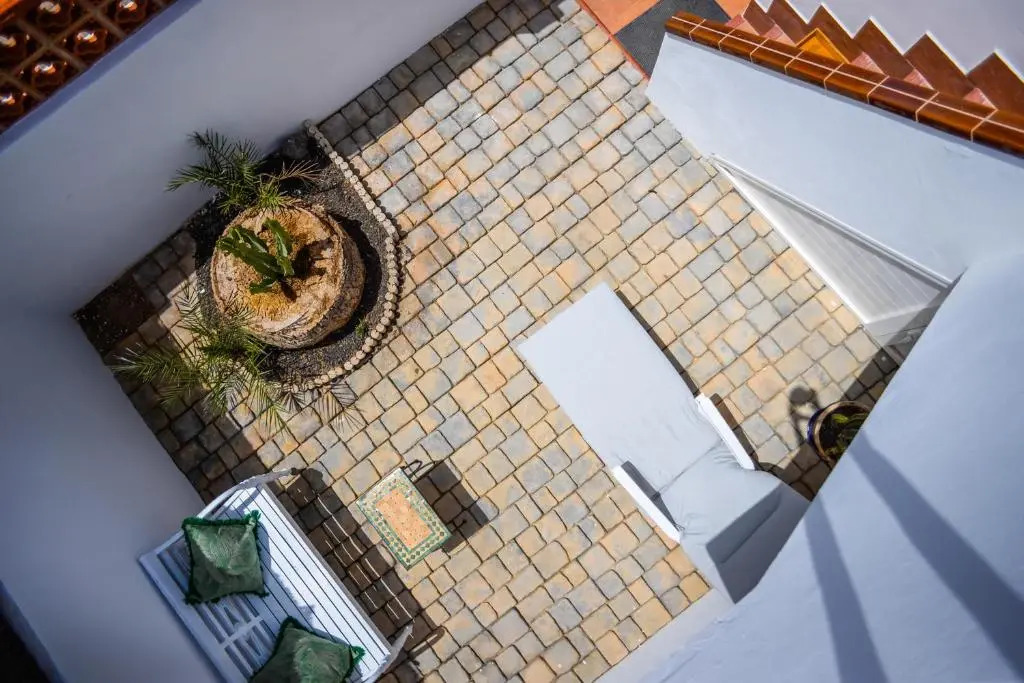 Bohemian Seafront Bungalow Paradise with BBQ, Garden, Terrace & Free Wifi by Holidays Home