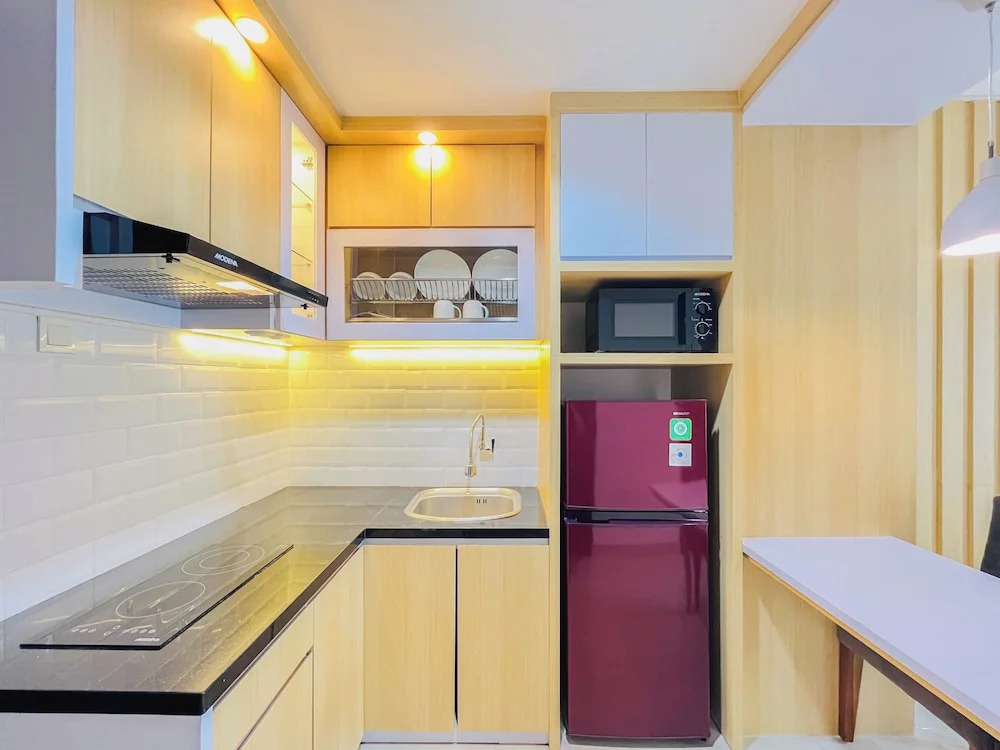 Neat Warm Wooden Tone 1Br At Patraland Amarta Apartment