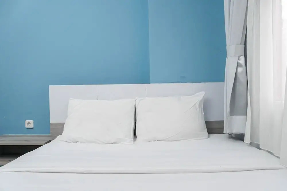 Relaxing and Warm 2BR @ Green Pramuka City Apartment