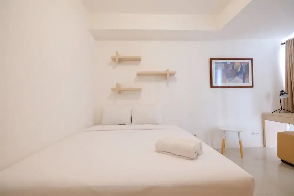 Spacious 2 Bedroom at Bassura City Apartment By Travelio