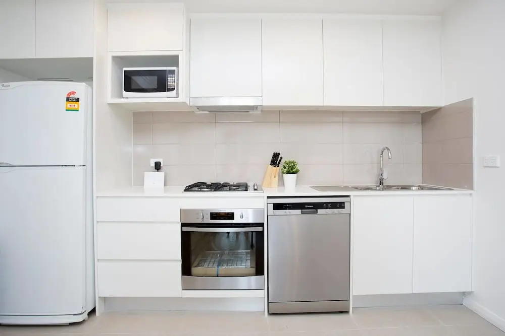 Designer Executive Apartment + Parking near Train