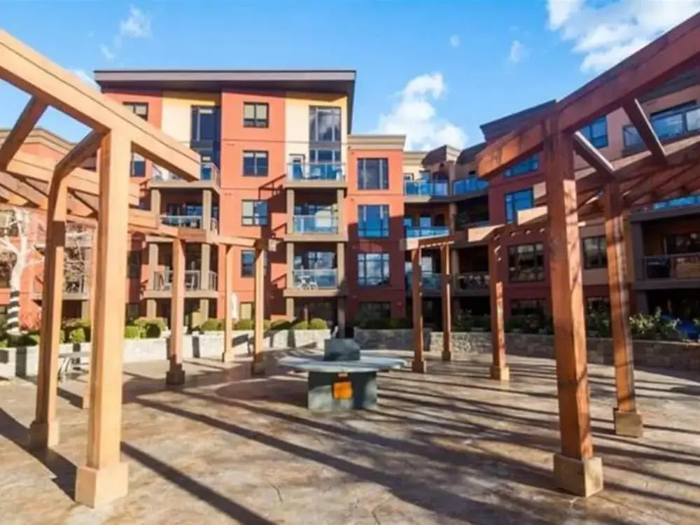 Bright Corner Unit with Lake and Pool Views #543