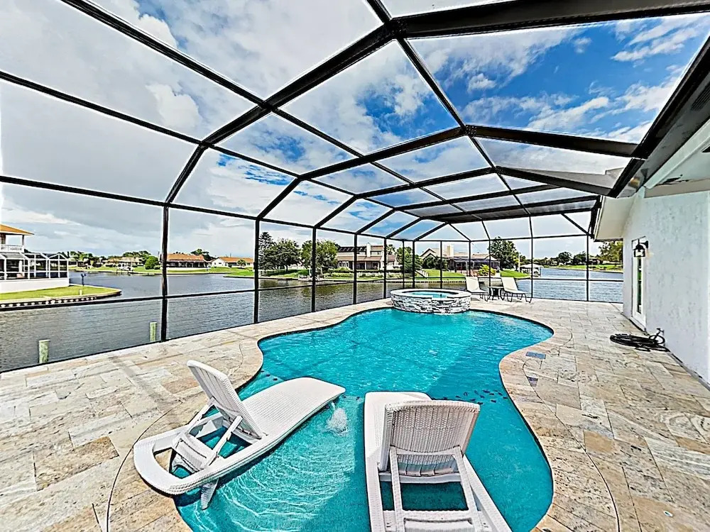 Waterfront W/ Stunning Views, Pool, Boat Dock 4 Bedroom Home