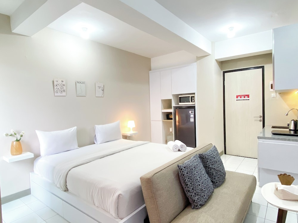Minimalist And Homey Studio At Grand Kamala Lagoon Apartment