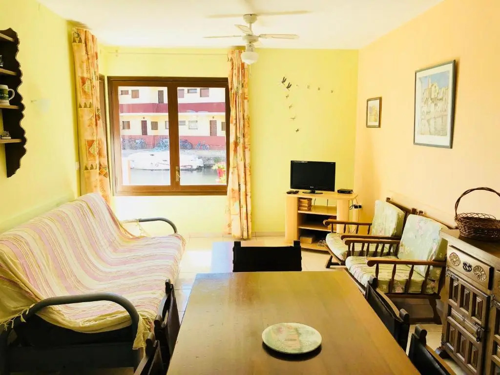 PORT SOTAVENT 16A - Apartamento en la Marina de Empuriabrava - piscina comunitaria, - parking - vistas al canal - cerca centro y playa