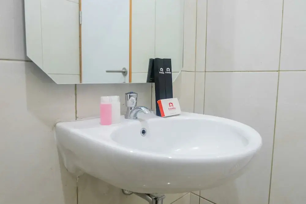 Brand New Compact Studio The Nest Puri Apartment By Travelio