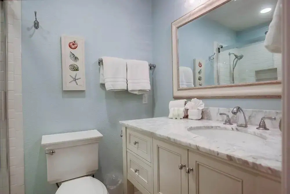 Coastal Chic Furnishings Condo Steps to Beach SBTC 128 by RedAwning