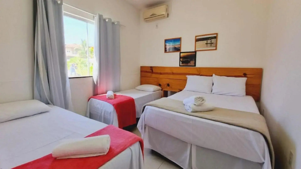 Casa de 4 suítes com piscina e área gourmet em Porto Seguro - Casa dos Ipês