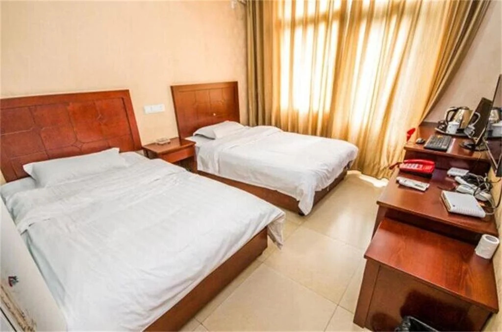 Yibin Meilun Business Hotel