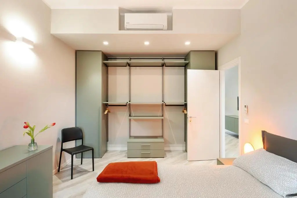 GuestHost - Maggiore Residence Flats