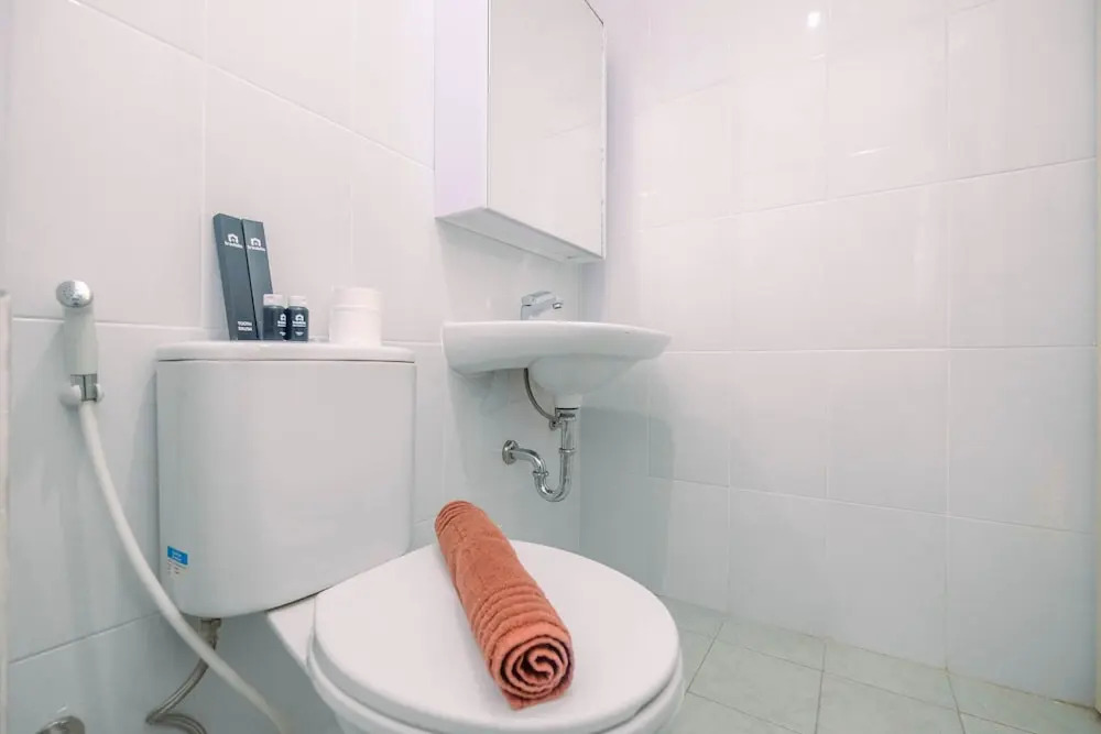 Minimalist and Cozy 1BR Patraland Urbano Apartment By Travelio