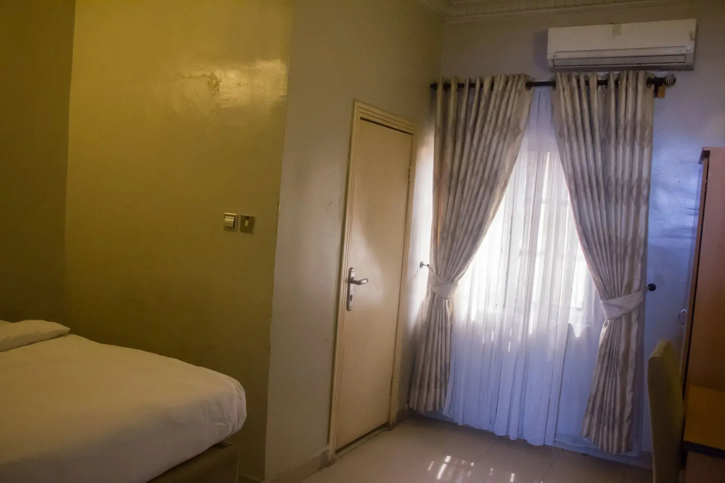 Triple Tee Hotel