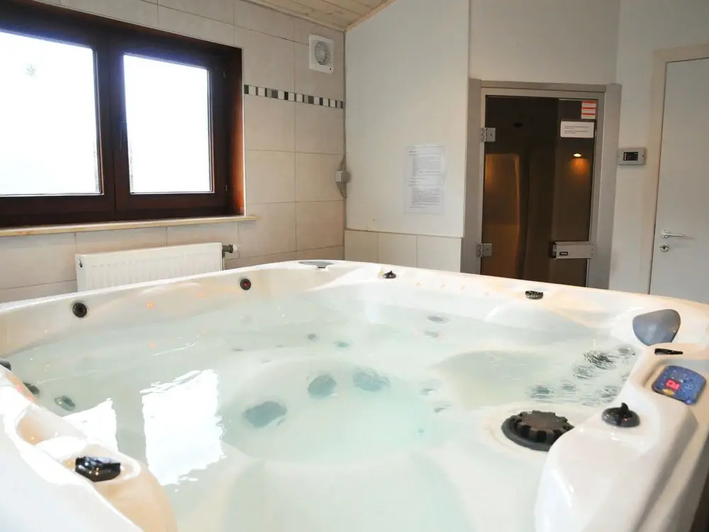 Holiday Home with Hot Tub & Steam Room in Forest