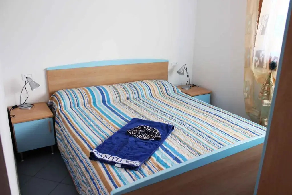 Appartamento con due Camere in Residence con Piscina a Rosolina Mare
